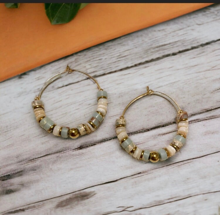 Boucles Précieuses |
Paloma en acier inoxydable et pierres semi précieuses