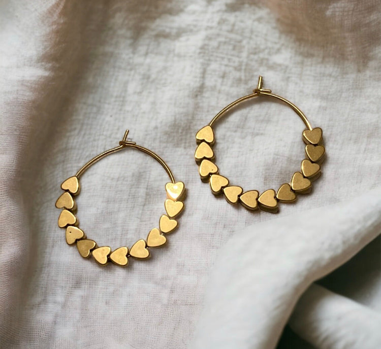 Boucles Précieuses |
Lovely en acier inoxydable et ses cœurs en hématite