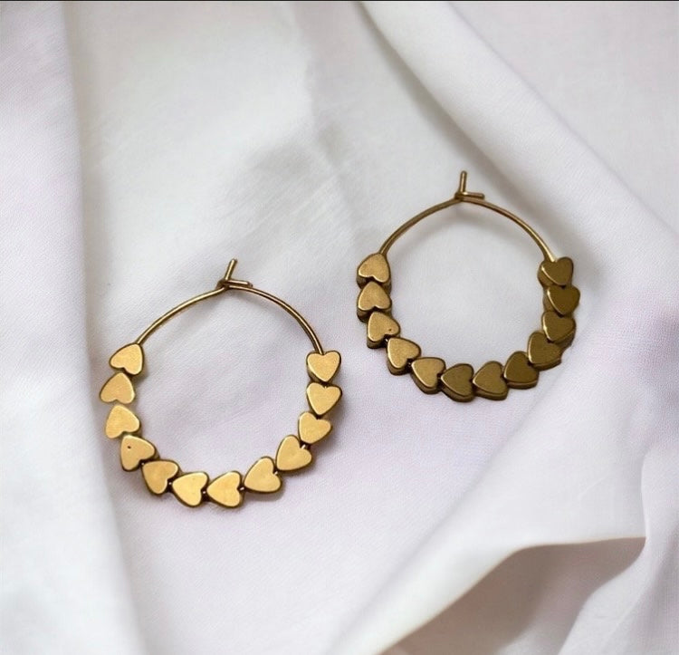 Boucles Précieuses |
Lovely en acier inoxydable et ses cœurs en hématite