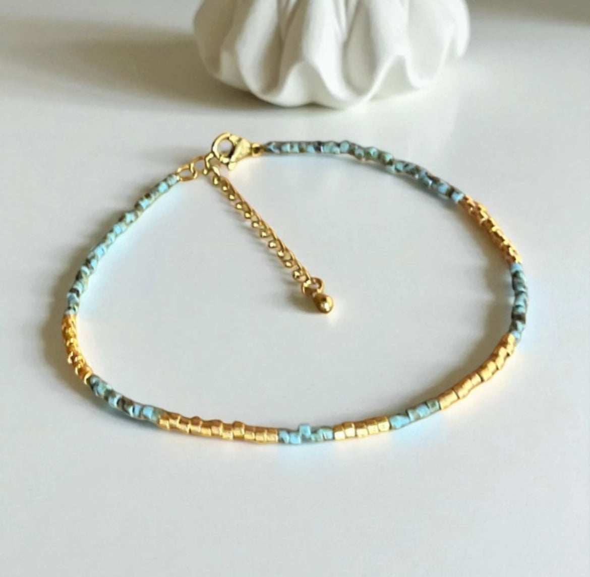 Poussière d’étoile | Bracelet de cheville Miyuki turquoise et or
